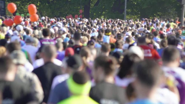 4K - Back view of marathon crowd