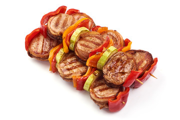 BBQ grilled Pork medallions wrapped in bacon, macro, isolated on white background