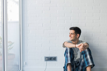 young man in pajamas in the morning at home or room