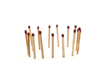 matches stand in the circle on a white background