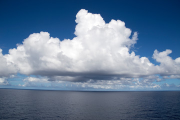 Naklejka na ściany i meble Clouds and Caribbean sea from a cruise ship 