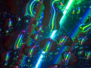 Sweet rainbow disco gradient. Natural lighting effects. Background image is abstract blurred backdrop. Defocused urban abstract texture. Ecological ideas for your graphic design, banner, or poster