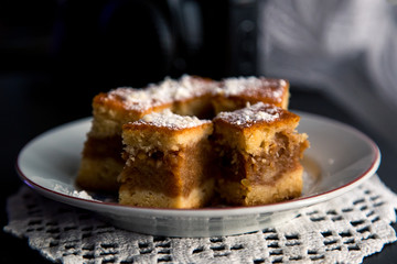 A few pieces of apple pie on the plate