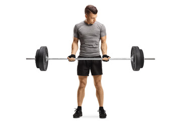 Young fit guy lifting weights