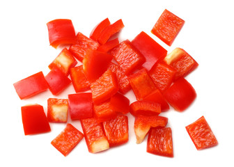 cut slices of red sweet bell pepper isolated on white background top view