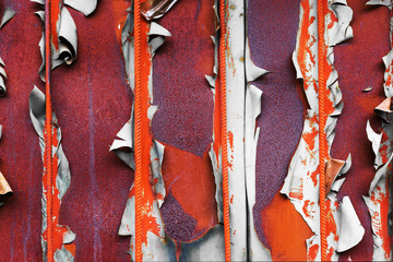 Old shabby surface with metal orange rods. Abstract background.