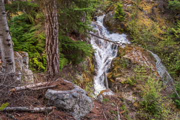 Majestic waterfall in Vancouver, Canada. View with mountain background.