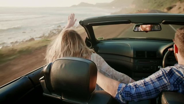 Couple in convertible happy in love