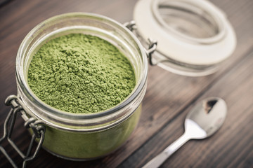 Moringa powder in glass jar
