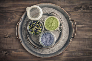 Green and blue matcha tea powder