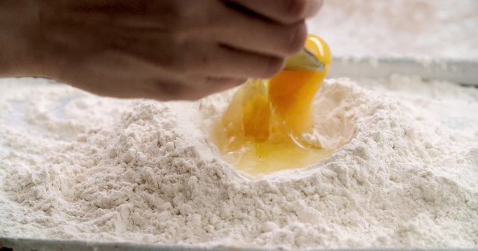 Beating egg into flour