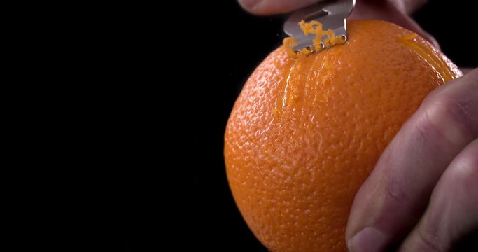 Citrus zester on dark background 