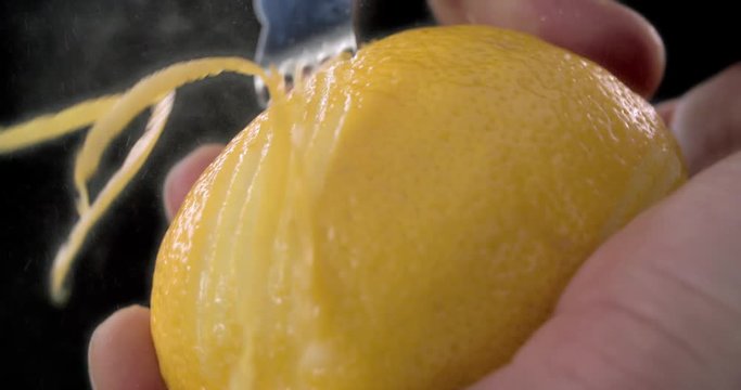 Peels of lemon zest from citrus zester