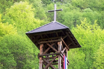 Church Roof with a cross. Church building roof with holy cross - 270492755