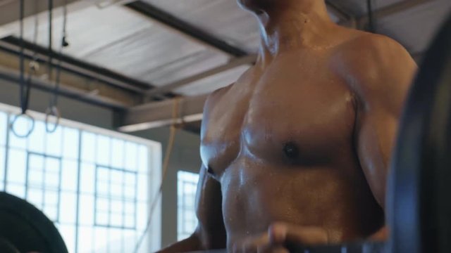 Muscular pecs and biceps close up