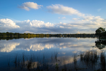 Beautiful cloudy sky reflected over the water