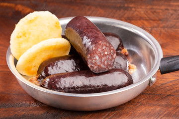 Blood sausage morcilla - Arepa ground base of ground dry corn.