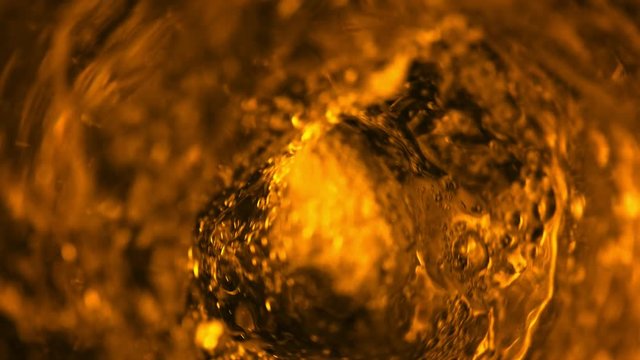 Super slow motion of pouring fuel oil in whirl shape. Filmed on high speed cinema camera, 1000 fps.