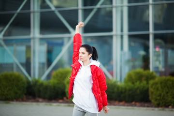 Fitness. Beautiful young woman doing exercises in the park