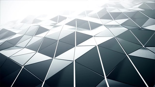 Abstract modern technology background with animation of waving smooth polygonal surface from glass, chrome or plastic with fog. Beautiful technological backdrop. Seamless loop 4k animation.
