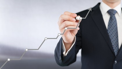 Businessman and  growing line ,symbolize growing Skills