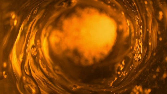 Super slow motion of pouring fuel oil in whirl shape. Filmed on high speed cinema camera, 1000 fps.