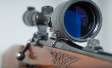Fototapeta na wymiar Scoped Hunting Rifle - Bolt Action Rifle