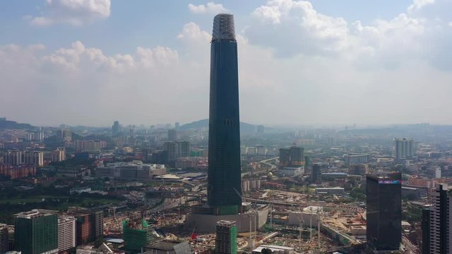 sunny day kuala lumpur new tallest building construction yard aerial panorama 4k malaysia