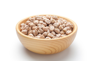 Dry chickpea in a wooden bowl isolated on white background.