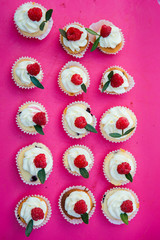 top view set of delicious mini tarts with custard and berries