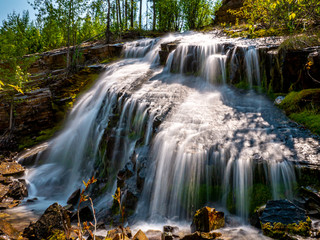 Fototapeta na wymiar Spring Water Fall in Flathead National Forest