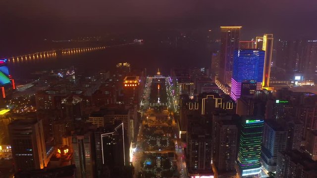 night time illumination macau city downtown traffic square aerial panorama 4k china