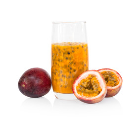 Fresh passion fruit juice in glass with green leaf isolated on white background, fruit healthy concept