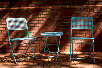 Pastel blue patio chairs outside