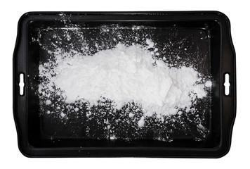 white flour on metal baking tray.