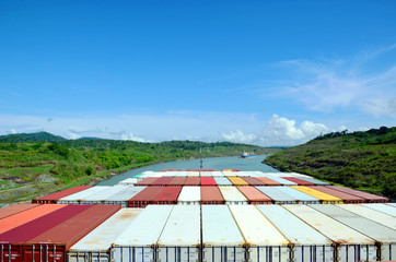 Container ships transiting through Panama Canal.
