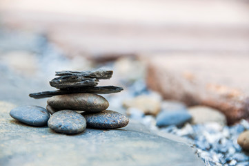 Zen stone on beach for perfect meditation, stack of pebble stones on balance on sand, Pebbles and sand stone composition, Zen stones garden, pile of balanced stone