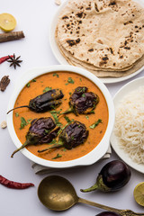 Baingan masala / Eggplant / brinjal curry served with chapati and rice, selective focus