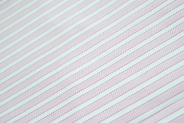 Diagonal lines pattern. Blue and white stripe texture background close up.
