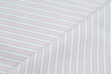 Obraz premium Diagonal lines pattern. Blue and white stripe texture background close up.