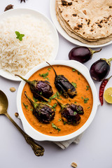 Baingan masala / Eggplant / brinjal curry served with chapati and rice, selective focus