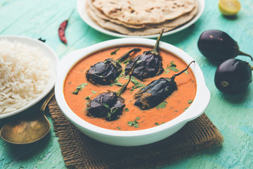 Baingan masala / Eggplant / brinjal curry served with chapati and rice, selective focus