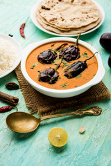 Baingan masala / Eggplant / brinjal curry served with chapati and rice, selective focus