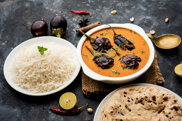 Baingan masala / Eggplant / brinjal curry served with chapati and rice, selective focus