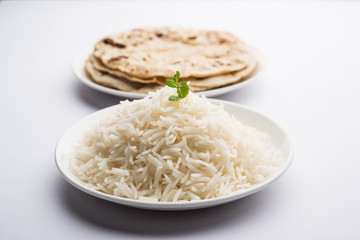Chapati / Roti with Cooked plain rice, selective focus