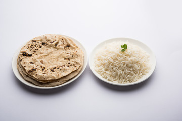 Chapati / Roti with Cooked plain rice, selective focus