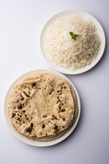 Chapati / Roti with Cooked plain rice, selective focus