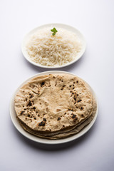 Chapati / Roti with Cooked plain rice, selective focus