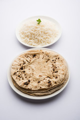 Chapati / Roti with Cooked plain rice, selective focus