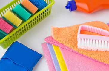 Items and liquid dishwashing detergent are on a white background